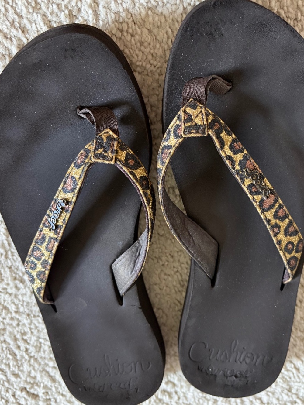 Reef leopard flip flops